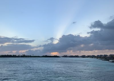 Cloudy Sunrays - Soneva Jani, Maldives by Aimee